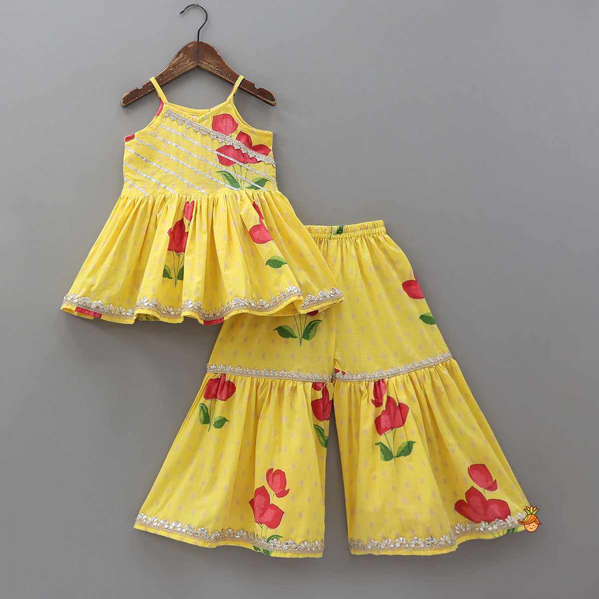 Vibrant Floral Strappy Peplum Top With Sharara And Dupatta