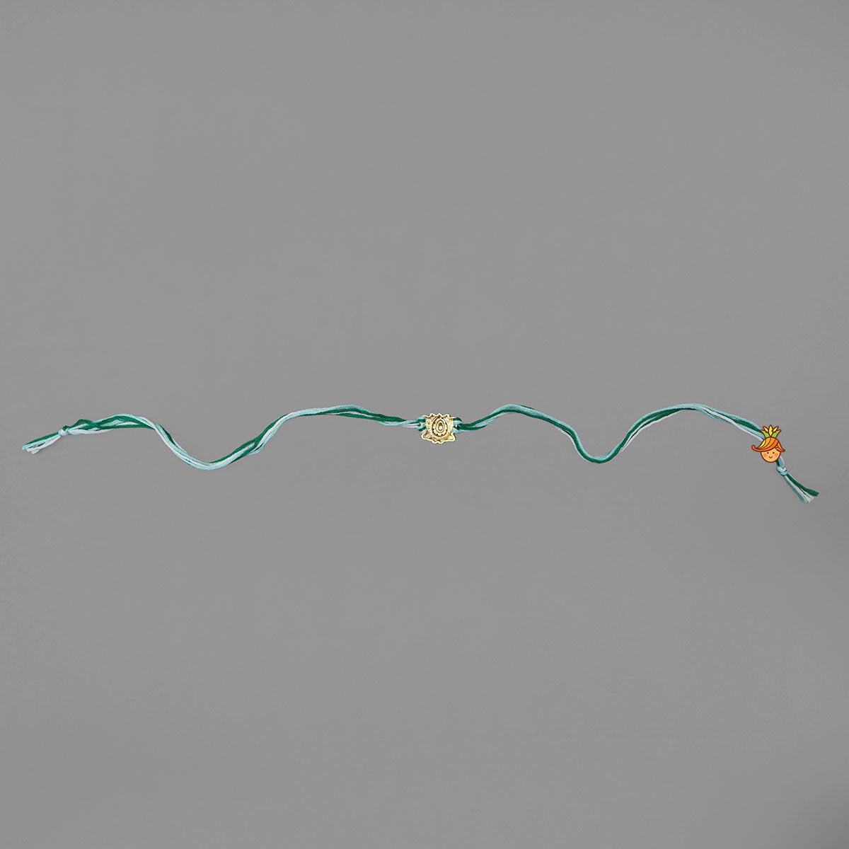 Cotton Thread Rakhi With Lotus Charm