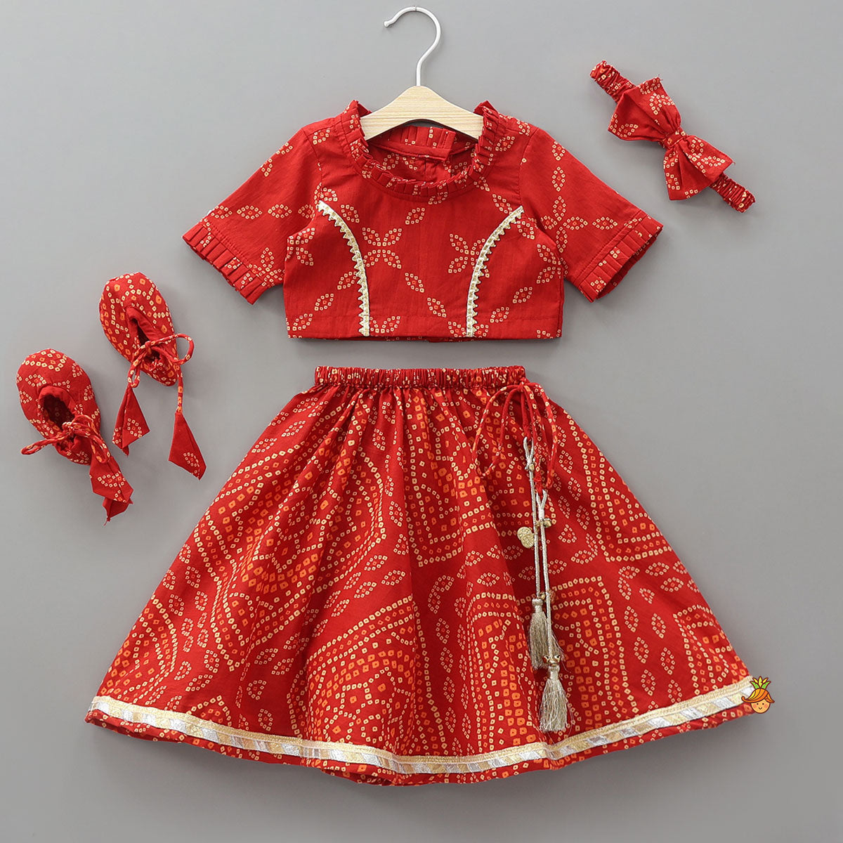 Bandhani Printed Crop Top And Lehenga With Matching Booties And Head Band