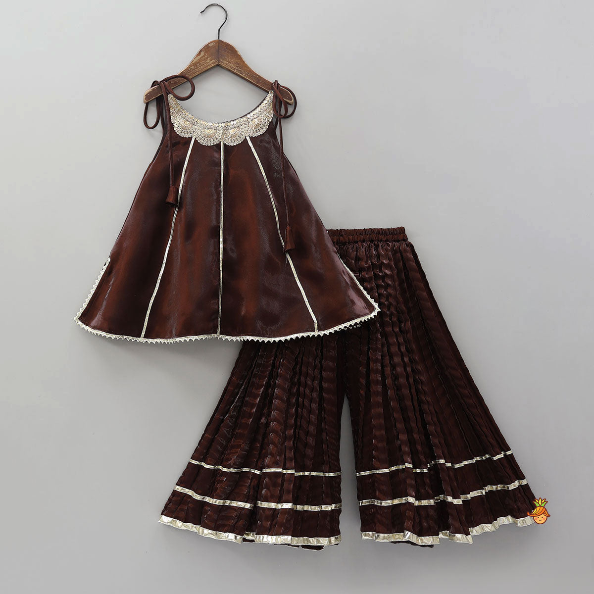 Sleeveless Sheen Kurti And Crushed Fabric Palazzo With Hair Tie