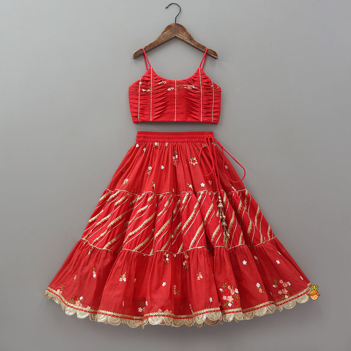Graceful Pleated Crop Top And Floral Tiered Lehenga With Dupatta