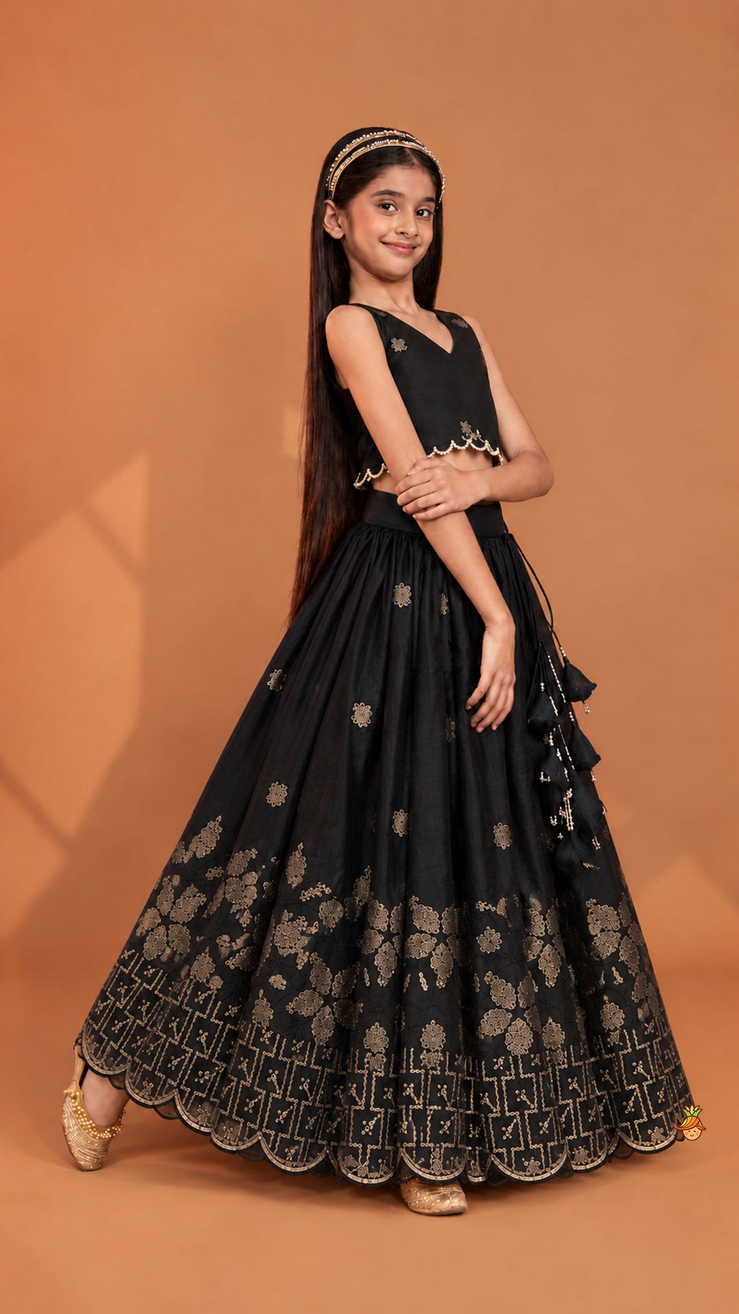 Exquisite Organza Top And Lehenga With Tassel Detailing