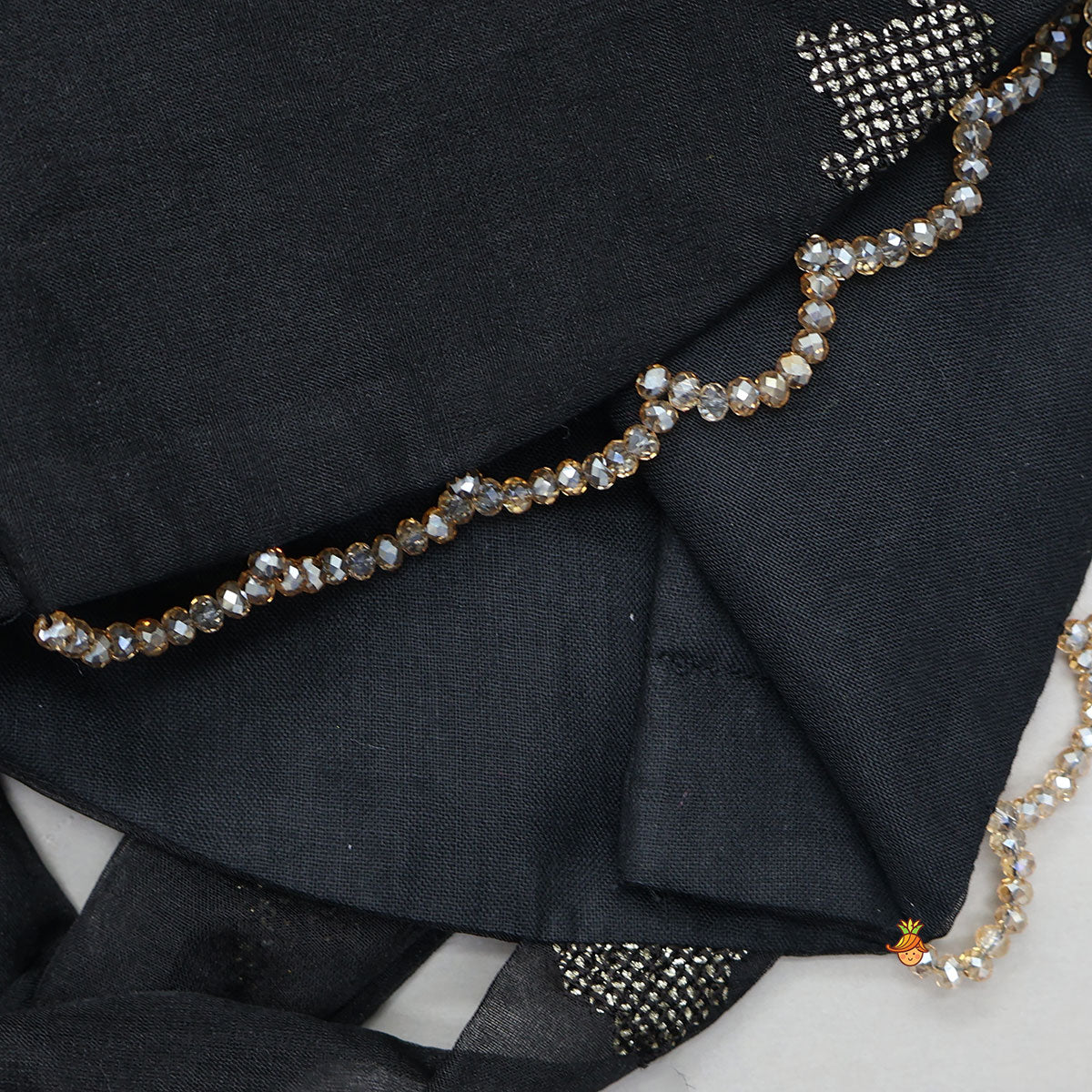 Exquisite Organza Top And Lehenga With Tassel Detailing