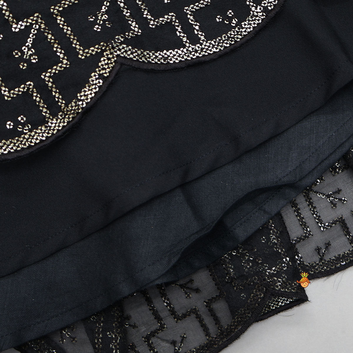 Exquisite Organza Top And Lehenga With Tassel Detailing