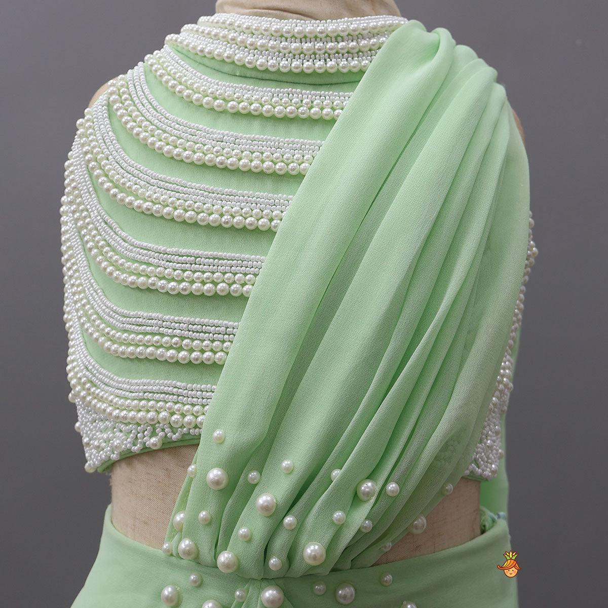 Beautiful Faux Pearl Embellished Pre Draped Saree