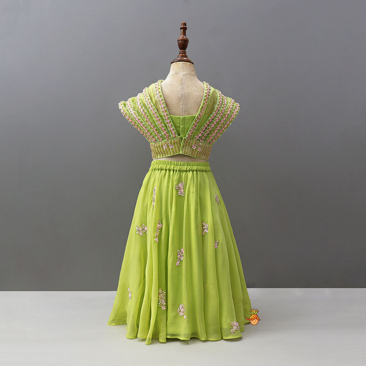 Top With Statement Cape And Floral Embroidered Flared Lehenga