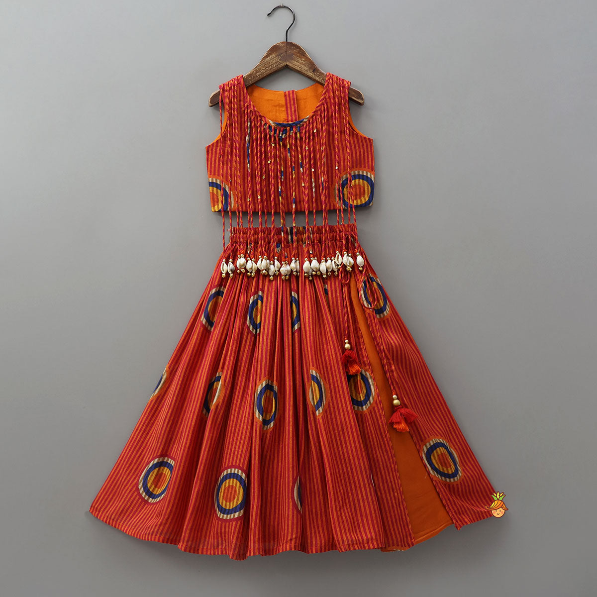 Fringes Adorned Striped Crop Top With Printed Lehenga
