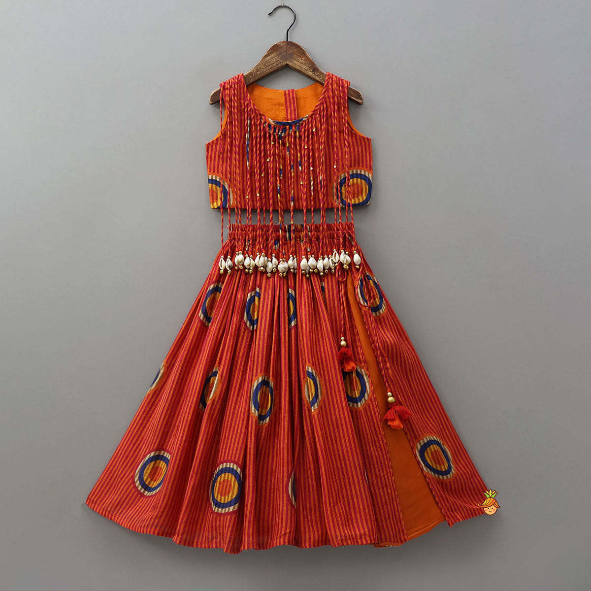 Fringes Adorned Striped Crop Top With Printed Lehenga