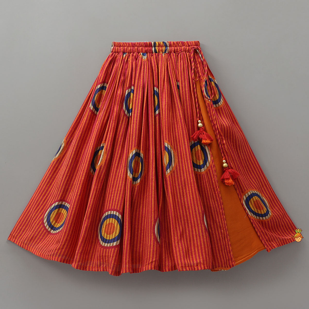 Fringes Adorned Striped Crop Top With Printed Lehenga