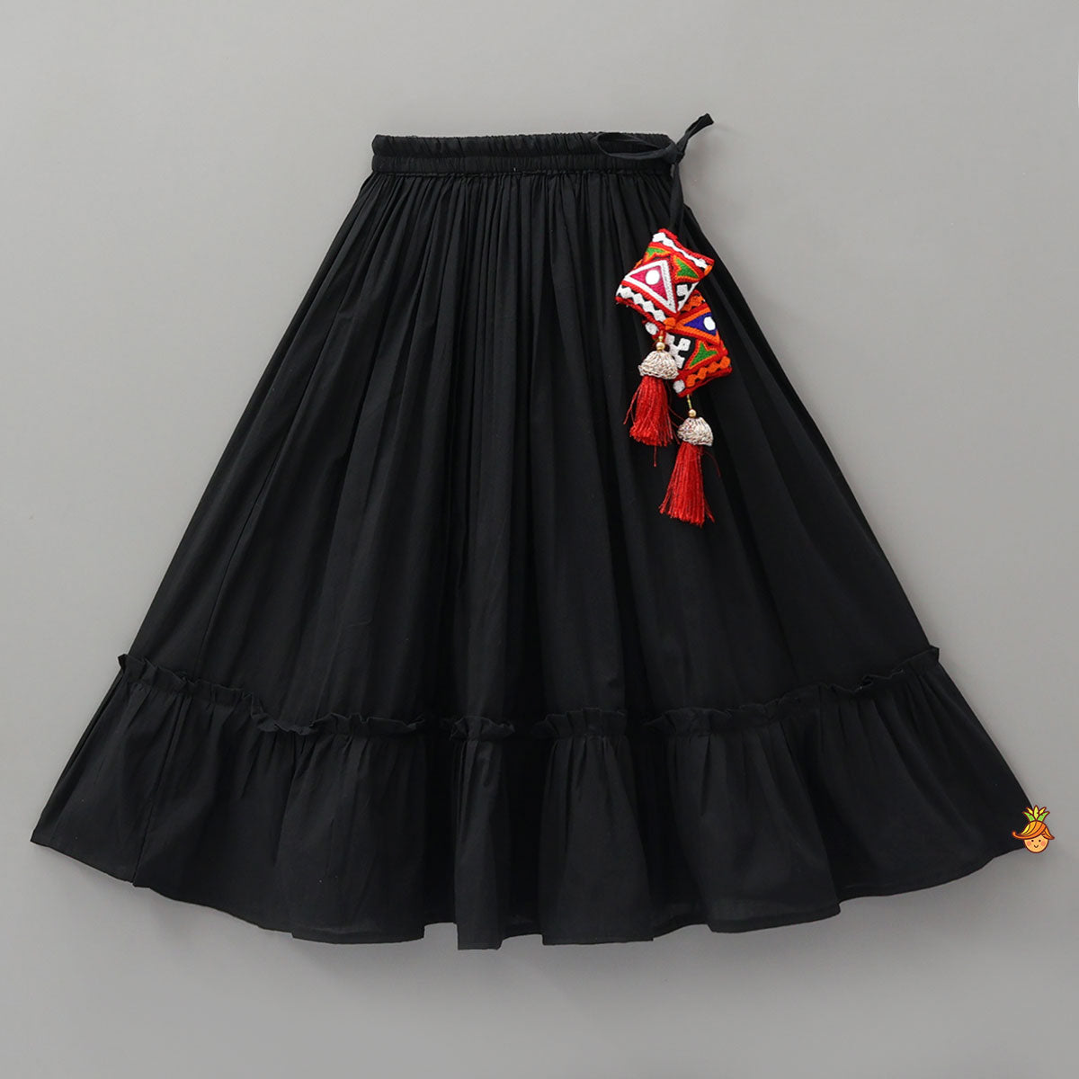 Top With Embroidered Overlay Cape And Tassel Detailed Flared Lehenga