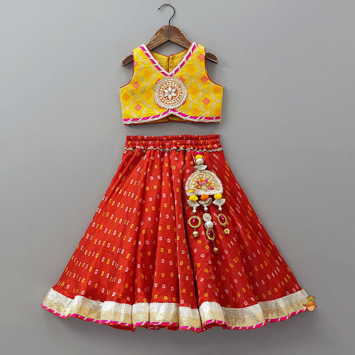 Stunning Crop Top And Tassel Detailed Bandhani Printed Sheen Lehenga With Dupatta