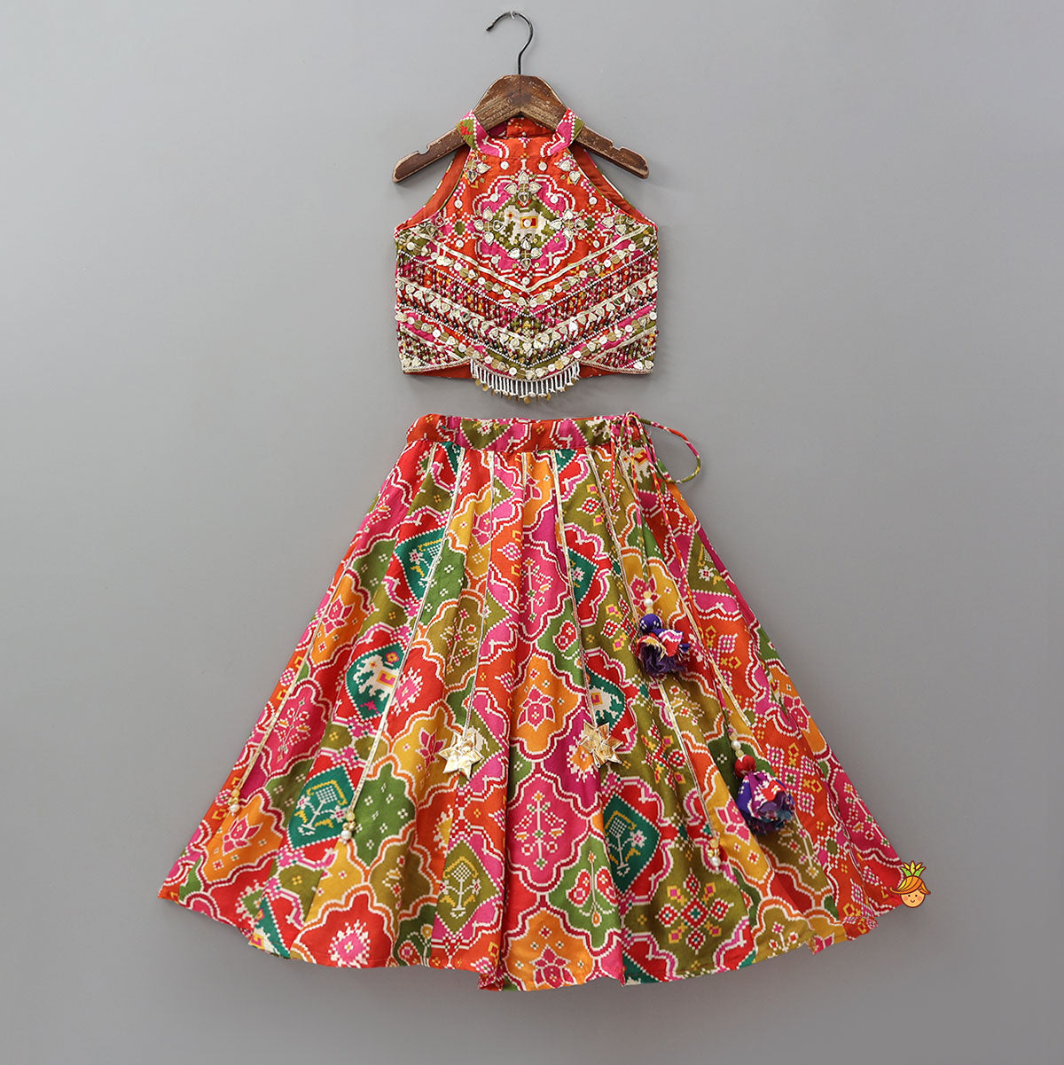 Halter Neck Heavily Embroidered Top And Lehenga With Dupatta And Potli Bag