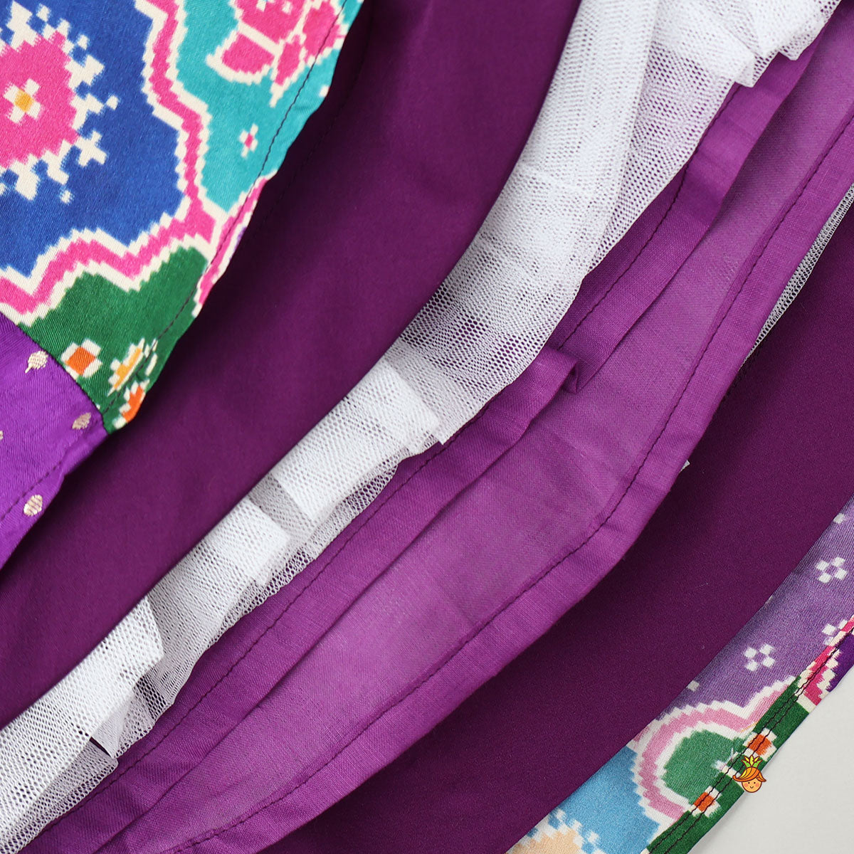 Heavily Embroidered Colourful Top And Lehenga With Potli Bag