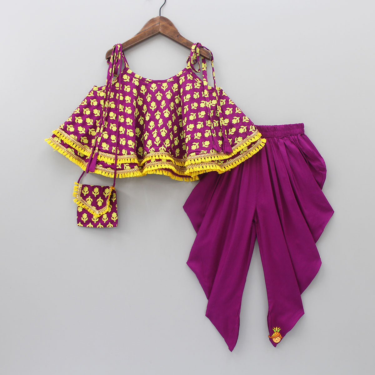Magenta Stylish Printed Lace Work Top And Dhoti With Matching Sling Bag