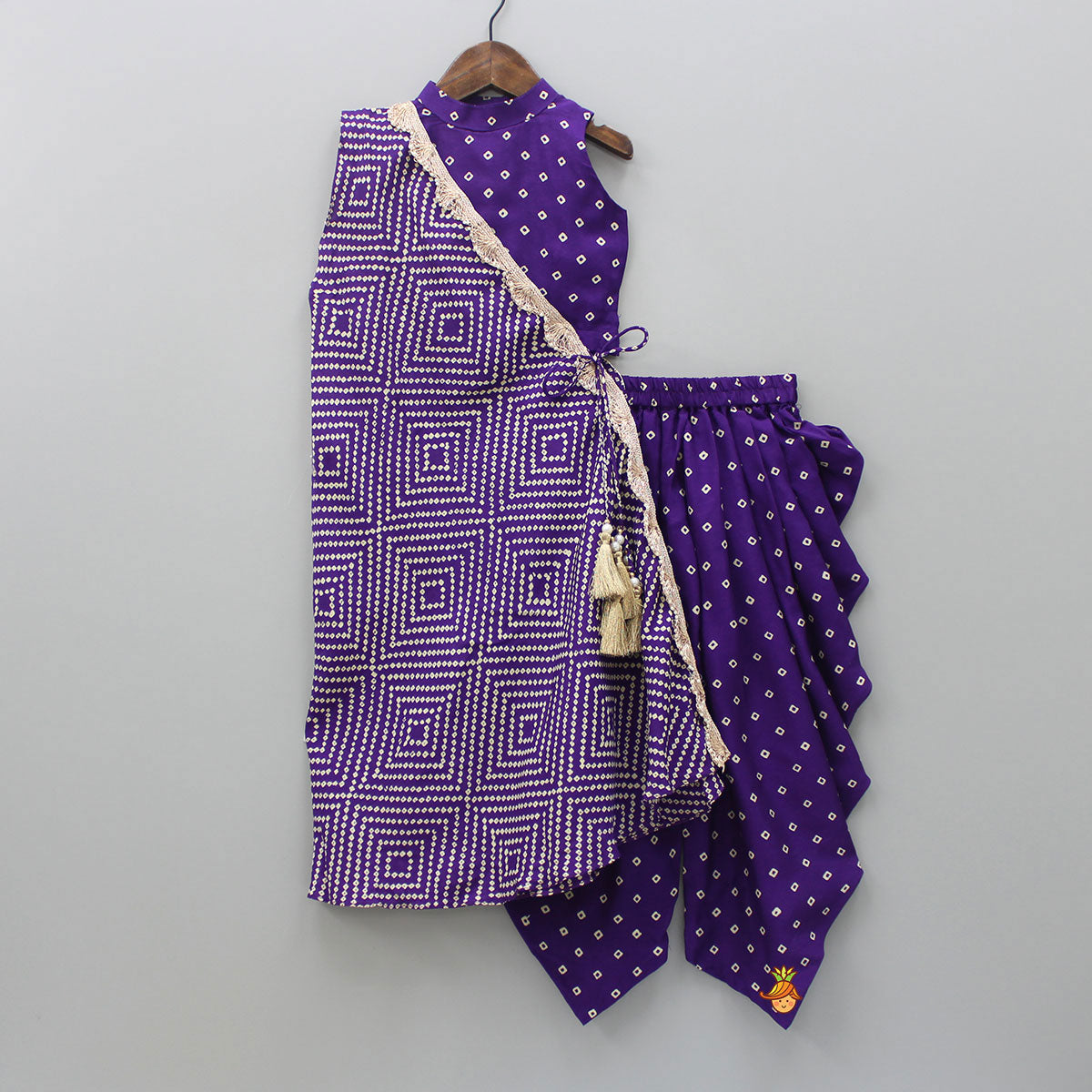 Pre Order: Purple Bandhani Printed Top And Dhoti With Cape Style Jacket