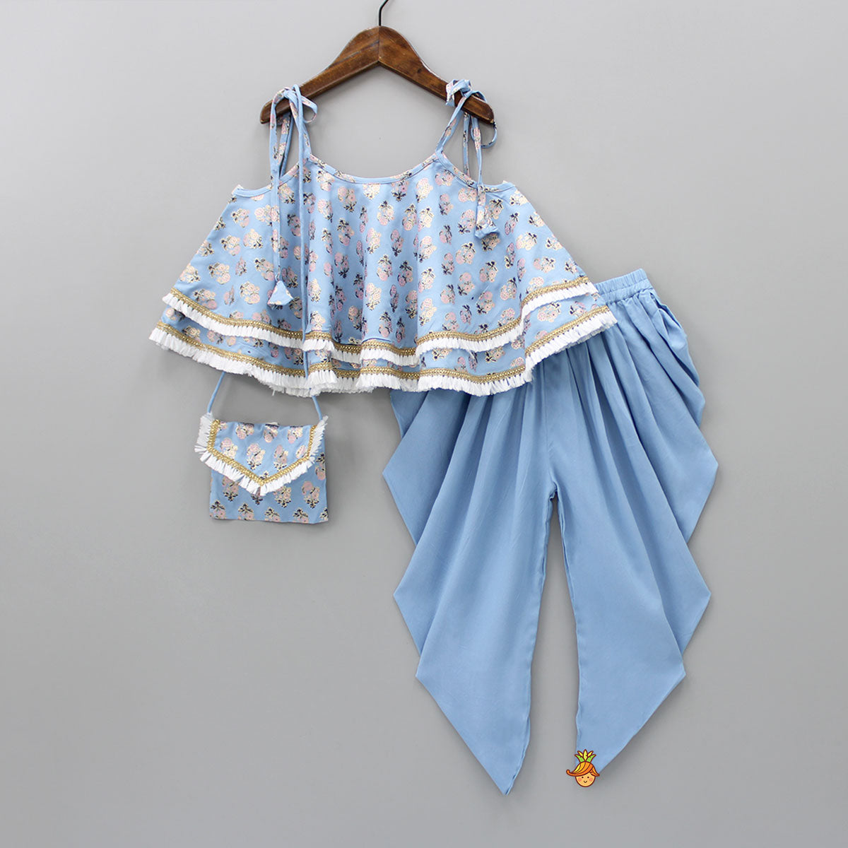 Powder Blue Foil And Floral Printed Lace Work Top And Dhoti With Matching Sling Bag