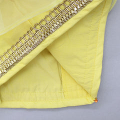 Pre Order: Organza Triple Layered Flap Pastel Yellow Top And Zari Embroidered Lehenga