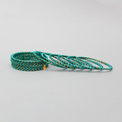 Silk Thread Work Peacock Green Iron Bangles - Set Of 12