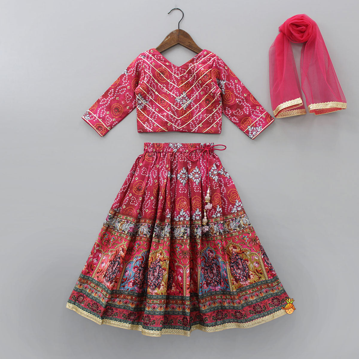 Chinon Bandhani Printed Pink Top And Pleated Lehenga With Lace Work Net Dupatta