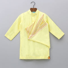 Pre Order: Beautiful Embroidered Yellow Flap Kurta And Button Adorned Stylish Pyjama