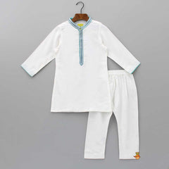 Pre Order: Embroidered Front Placket White Kurta With Pocket Detail Blue Jacket And Pyjama