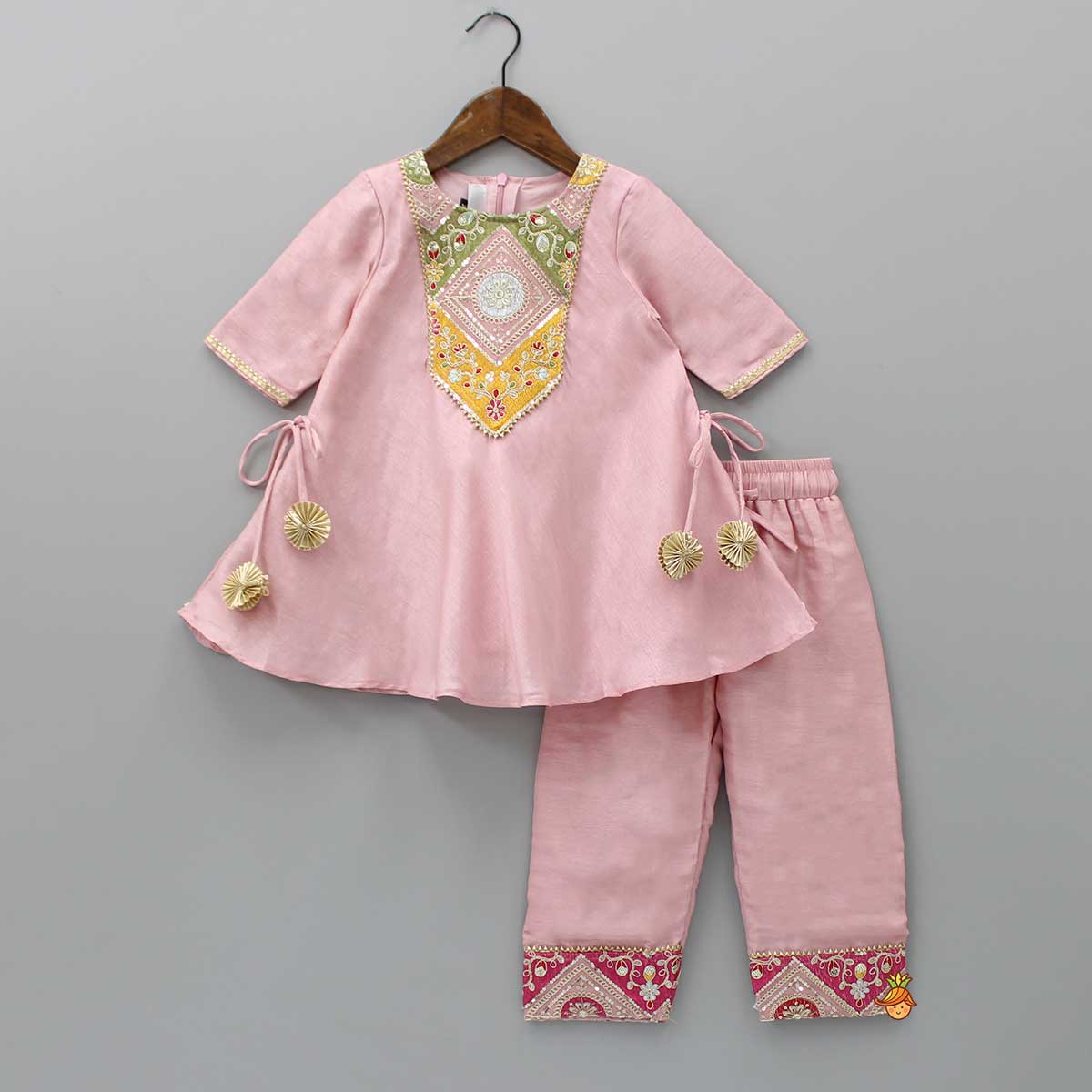 Pre Order: Embroidered Yoke Tassels Enhanced Pink Kurti And Pant