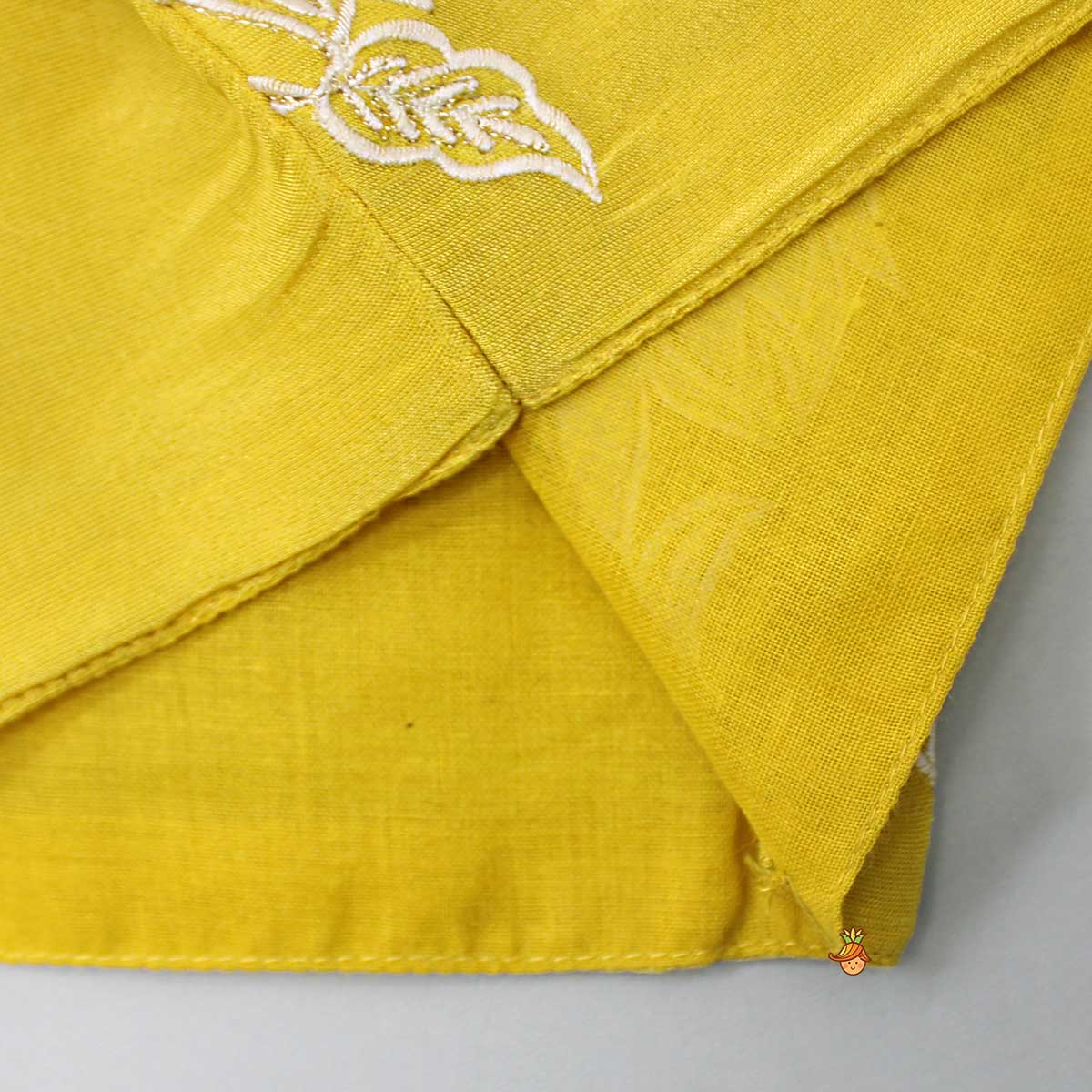 Pleated Neckline Yellow Top And Fringes Tassels Enhanced Lehenga