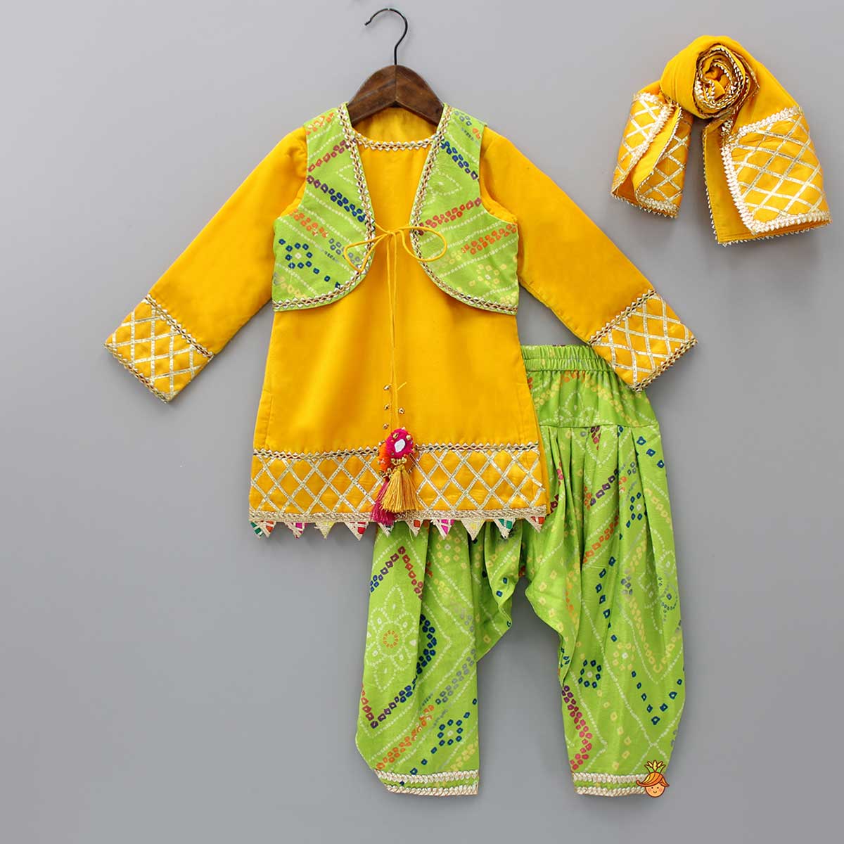 Pre Order: Yellow Velvet Kurti With Bandhani Printed Tie Up Jacket And Salwar With Matching Dupatta