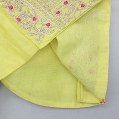 Pre Order: Back Knot Detail Lime Green Top And Contrasting Fringes Tassels Enhanced Lehenga