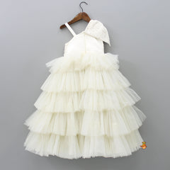 Pre Order: One Shoulder Multi Layered Net Off White Gown With Hair Clip